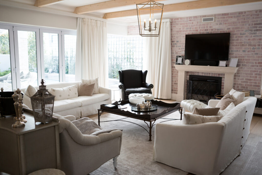 brightly lit neutral tone living room with firepla 2026 09 22 03 43 28 utc
