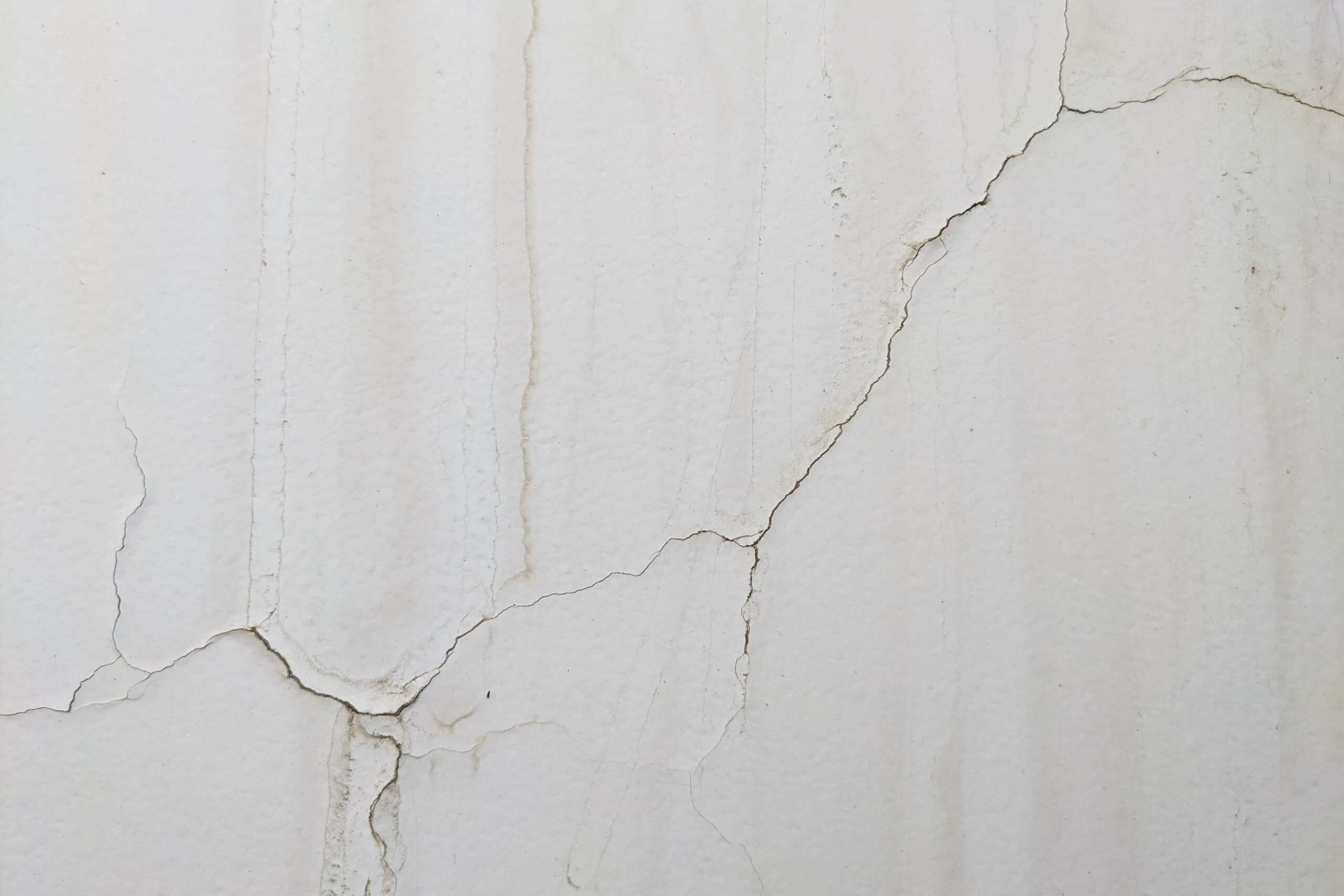 cracked and stained white surface close up 2026 09 21 17 15 34 utc scaled