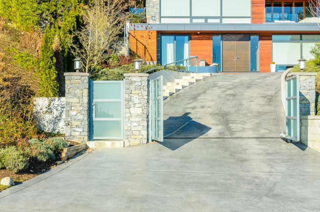 modern home entrance with stone walls and gate 2026 03 26 11 35 16 utc