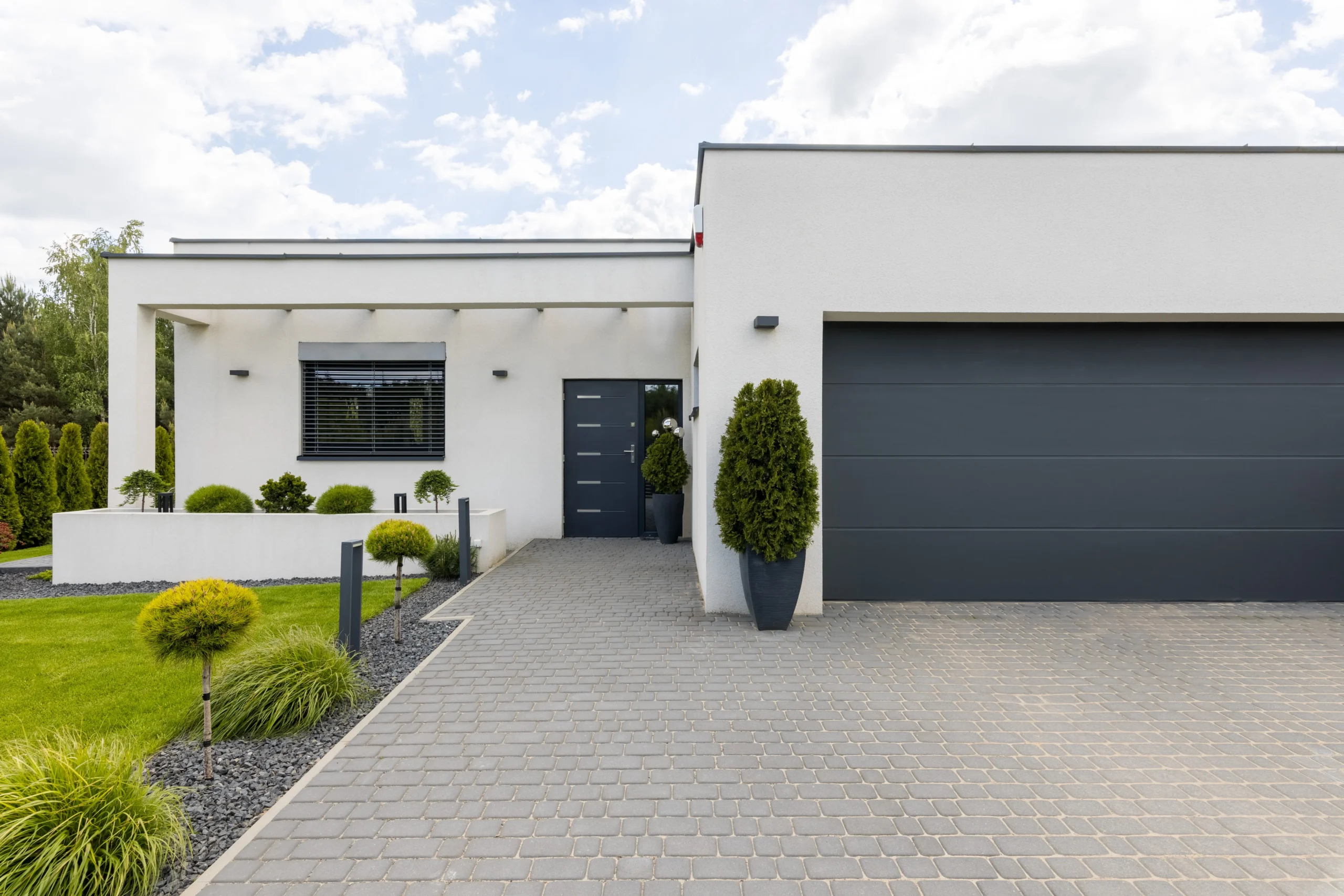 modern home exterior with beautifully landscaped y 2026 03 10 03 06 04 utc scaled